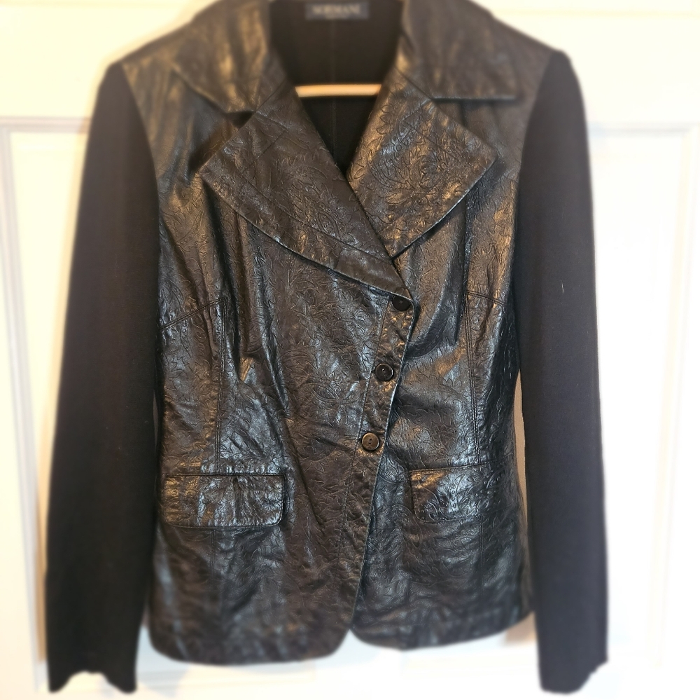 Sormani size 8 black  jacket with embosed leather front.